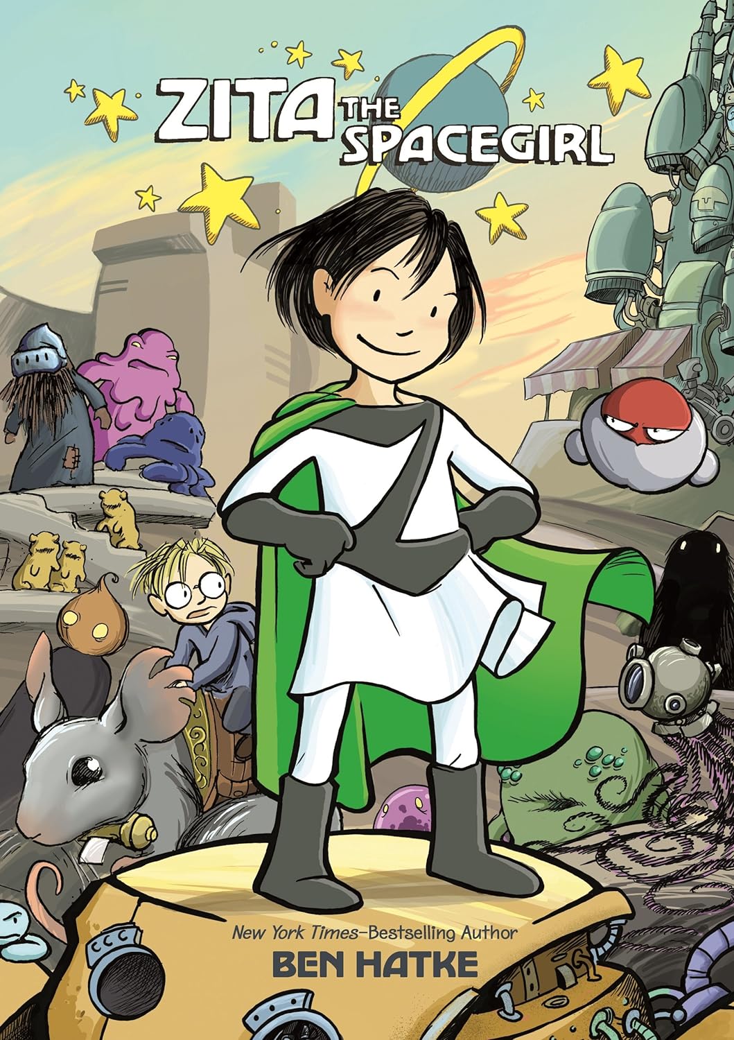 Illustration of the cover for "Zita the Spacegirl" graphic novel featuring the title character with a green cape, and various whimsical alien creatures and robots surrounding her.