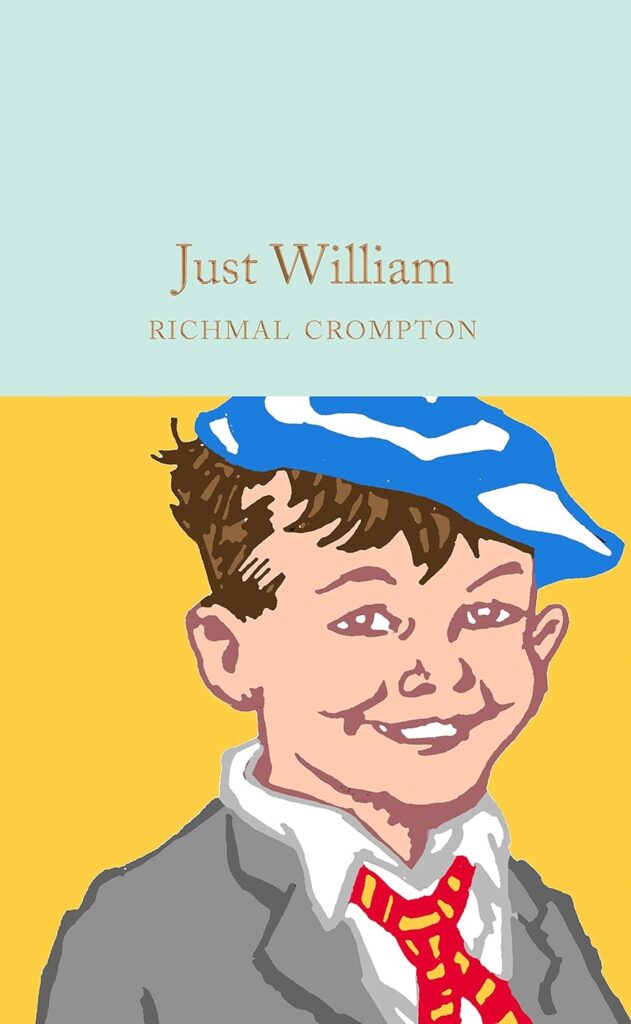 The illustrated cover of "Just William" by Richmal Crompton, featuring a boy in a blue cap, smiling with the mischievous charm that's coming soon to cinema screens.